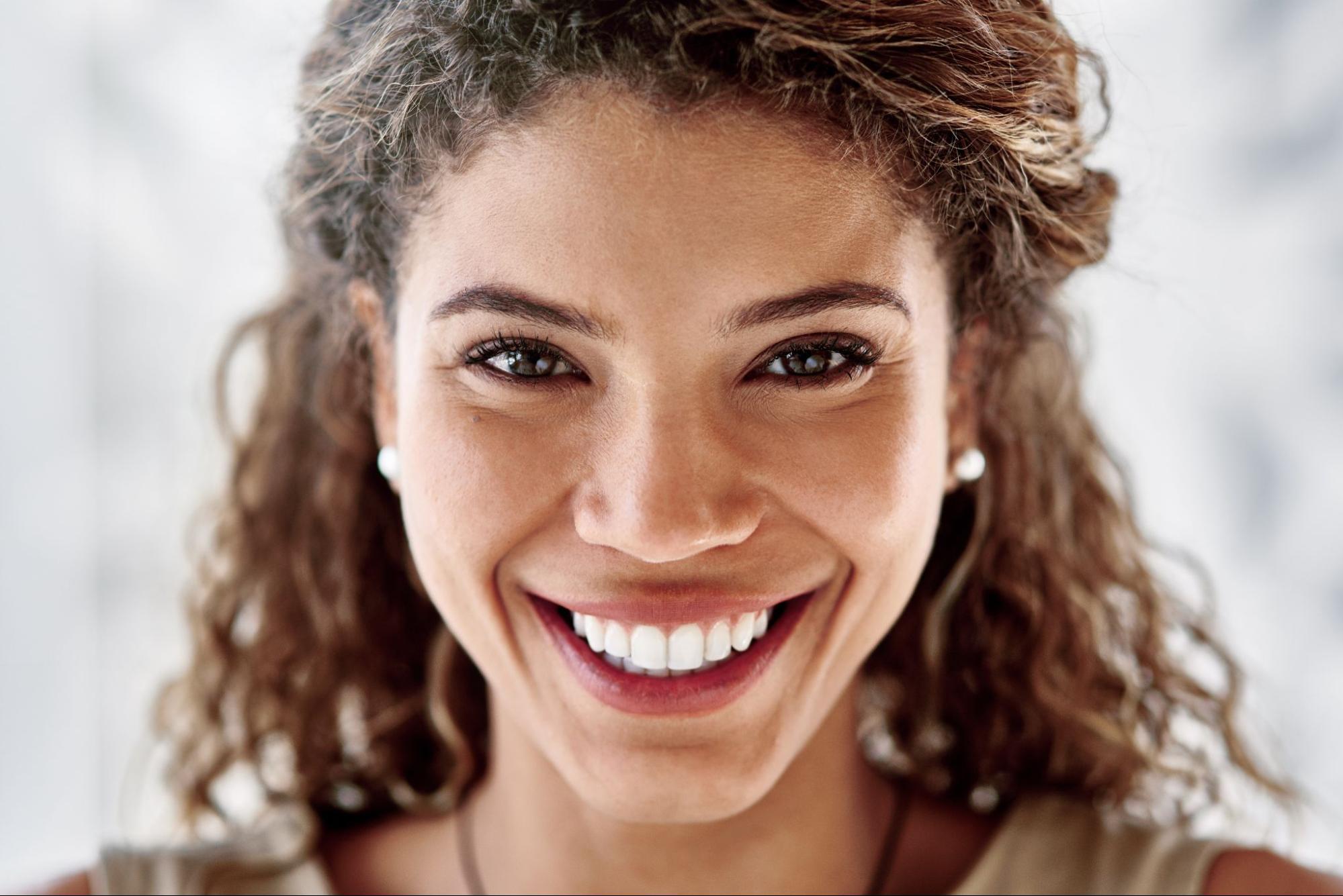 woman smiling directly at camera