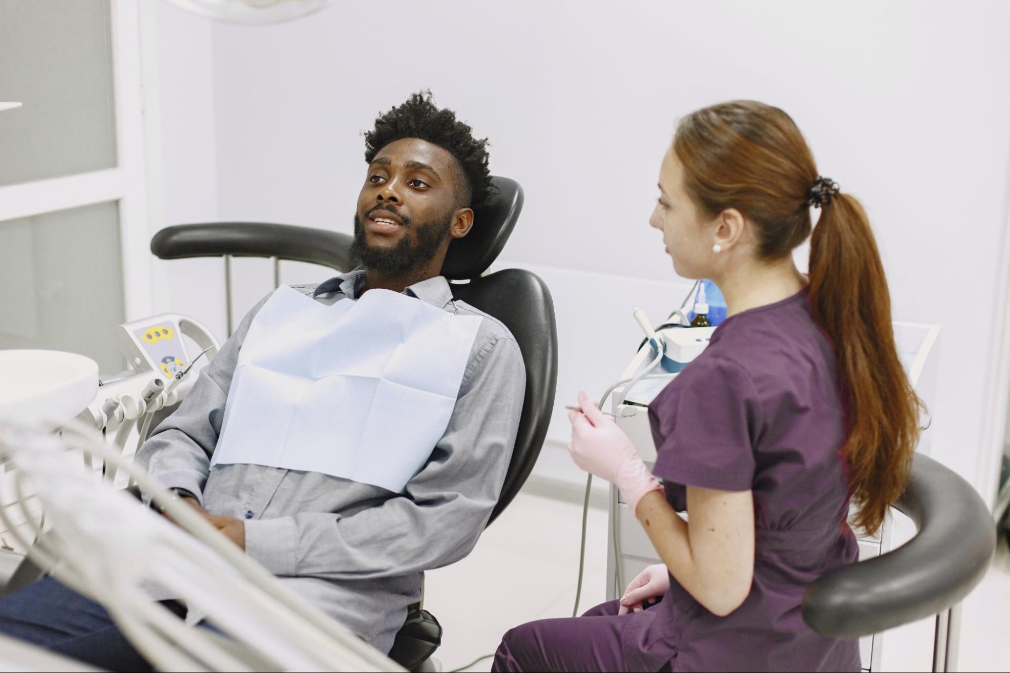 black man at dentist